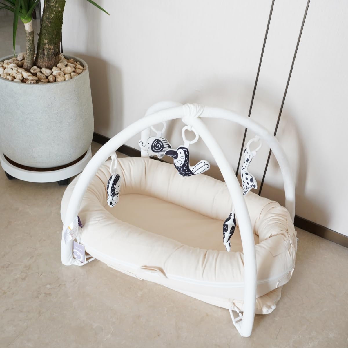 CooCooBaby machine-washable fabric keeps care quick and convenient.