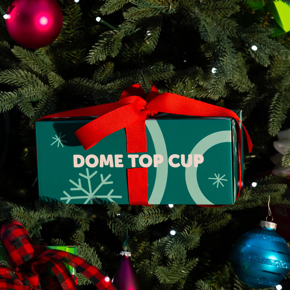 Cool Things Corp snowman dome cup serves as a festive holiday party favor.