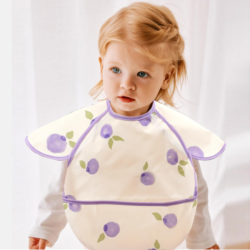 CoolaPeach bib fabric close-up reveals stain-resistant material easy to wipe clean