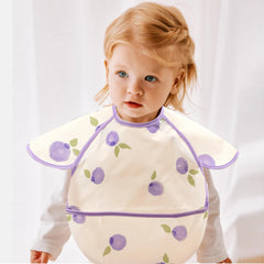 CoolaPeach bib fabric close-up reveals stain-resistant material easy to wipe clean