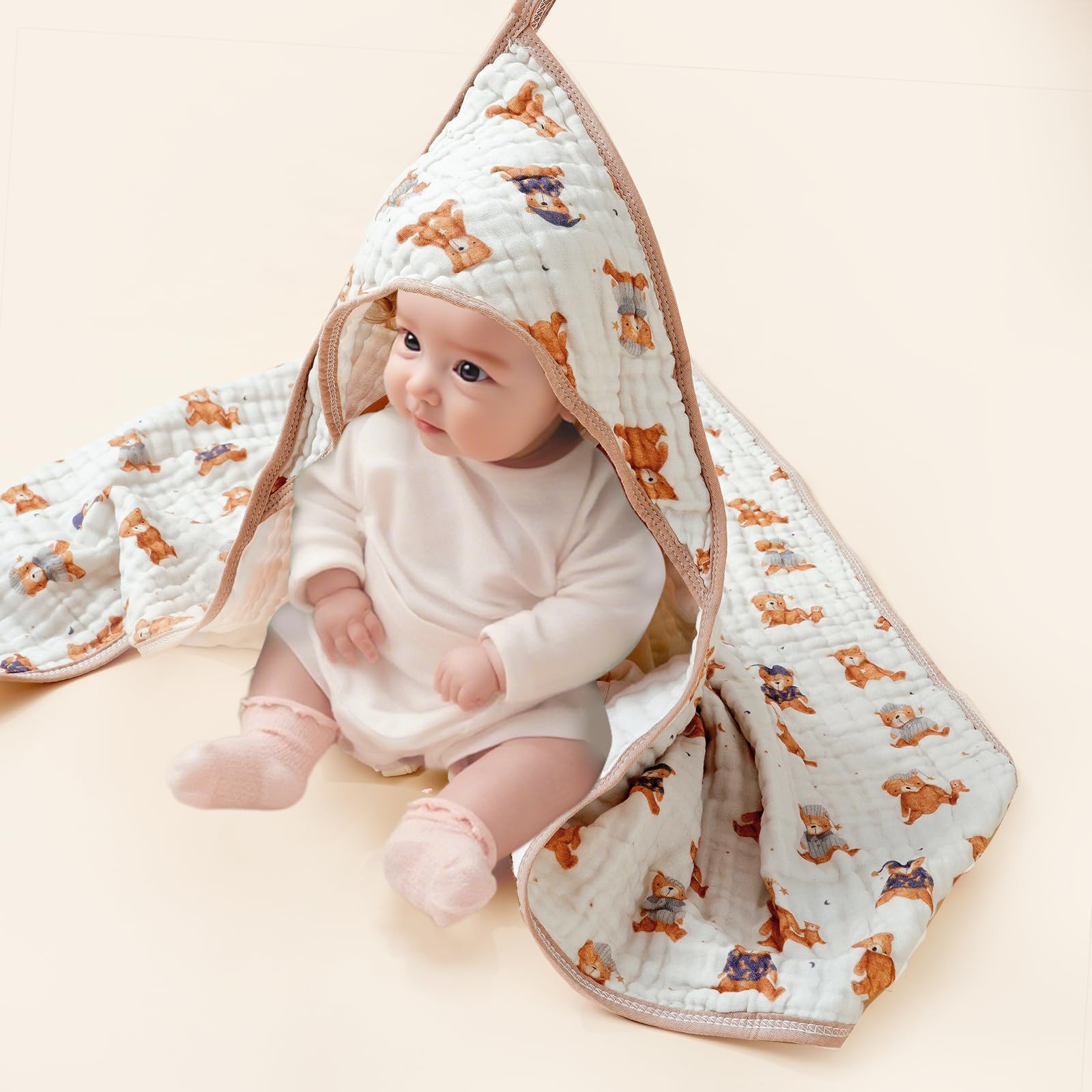 CoolaPeach multiuse towel doubles as swaddle or play mat.