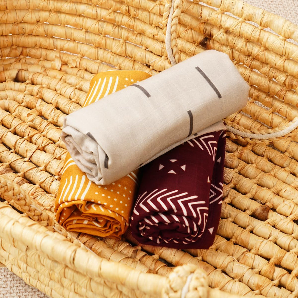 CoolaPeach muslin swaddle blanket baby swaddled, promoting a secure, soothing routine at nap time.