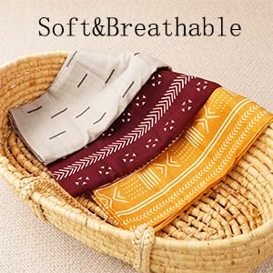 CoolaPeach muslin swaddle blanket close-up, lightweight breathable fabric supports quick drying and easy care.