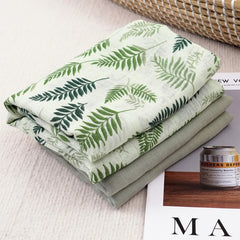 CoolaPeach muslin swaddle soft-texture-touch displays light, airy fabric for all-day comfort