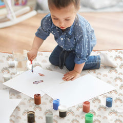 CoolaPeach splat mat serving as a soft playing mat during activities