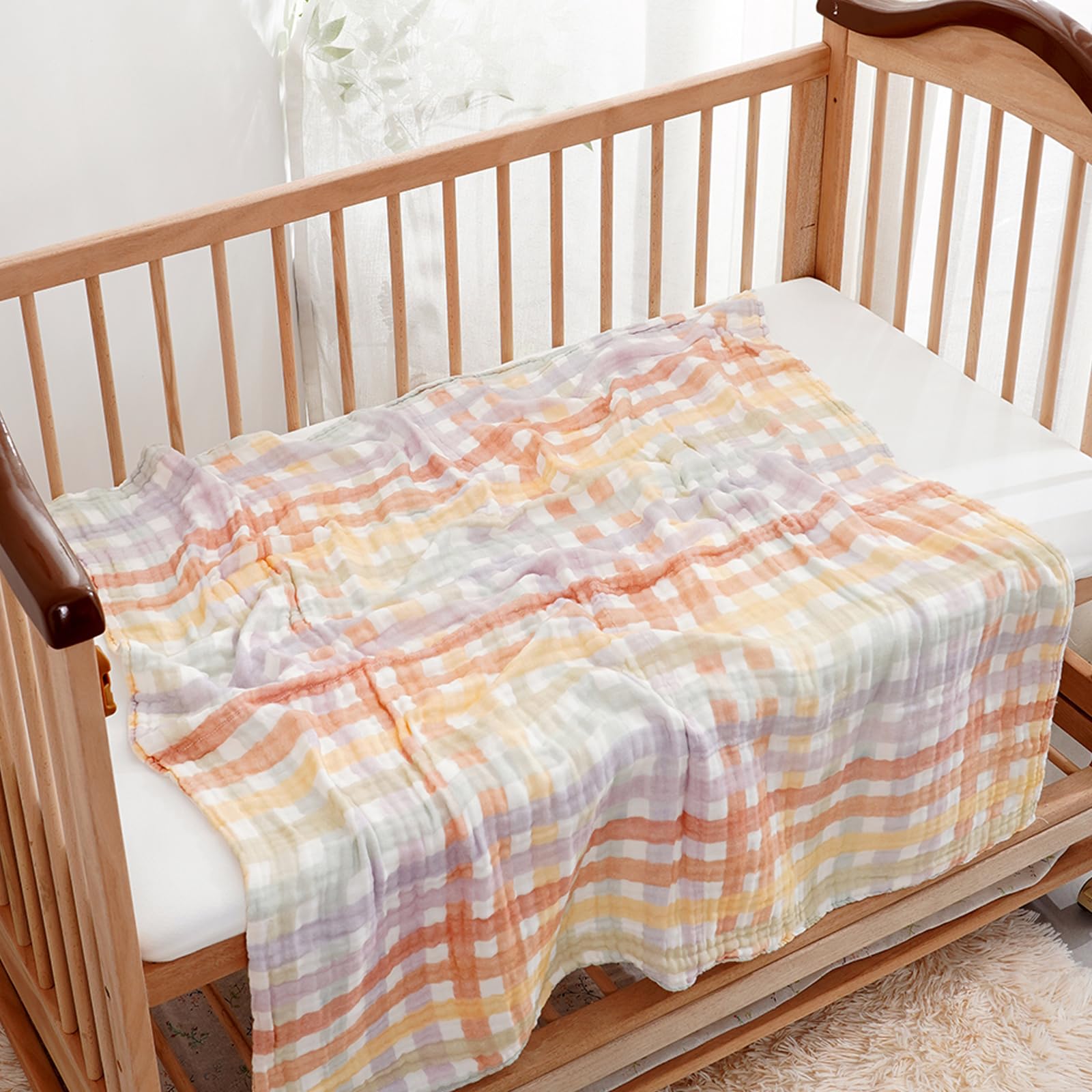 CoolaPeach stroller-blanket doubles as nursing cover for on-the-go use.