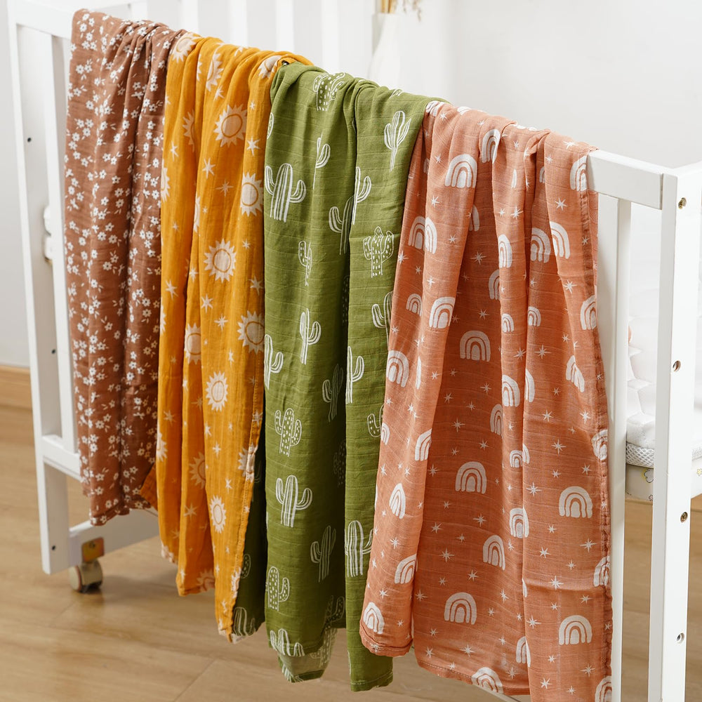 CoolaPeach swaddle blanket in use with baby demonstrating secure wrapping and coziness.