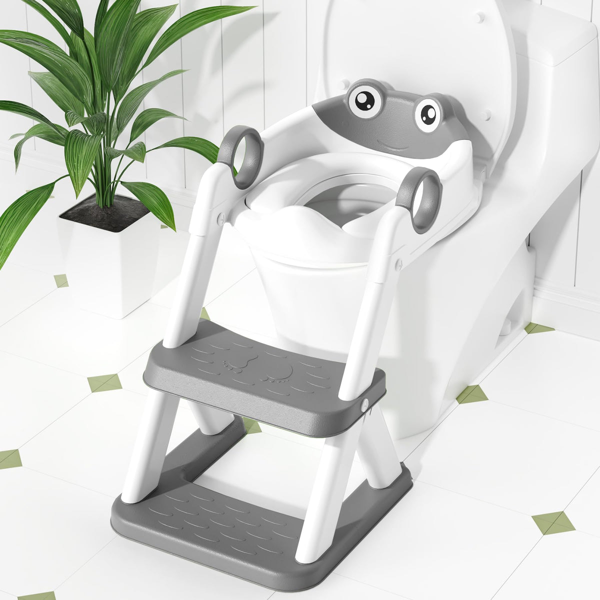 COOSEYA Frog toilet seat with a stable triangular base for safer toddler use.
