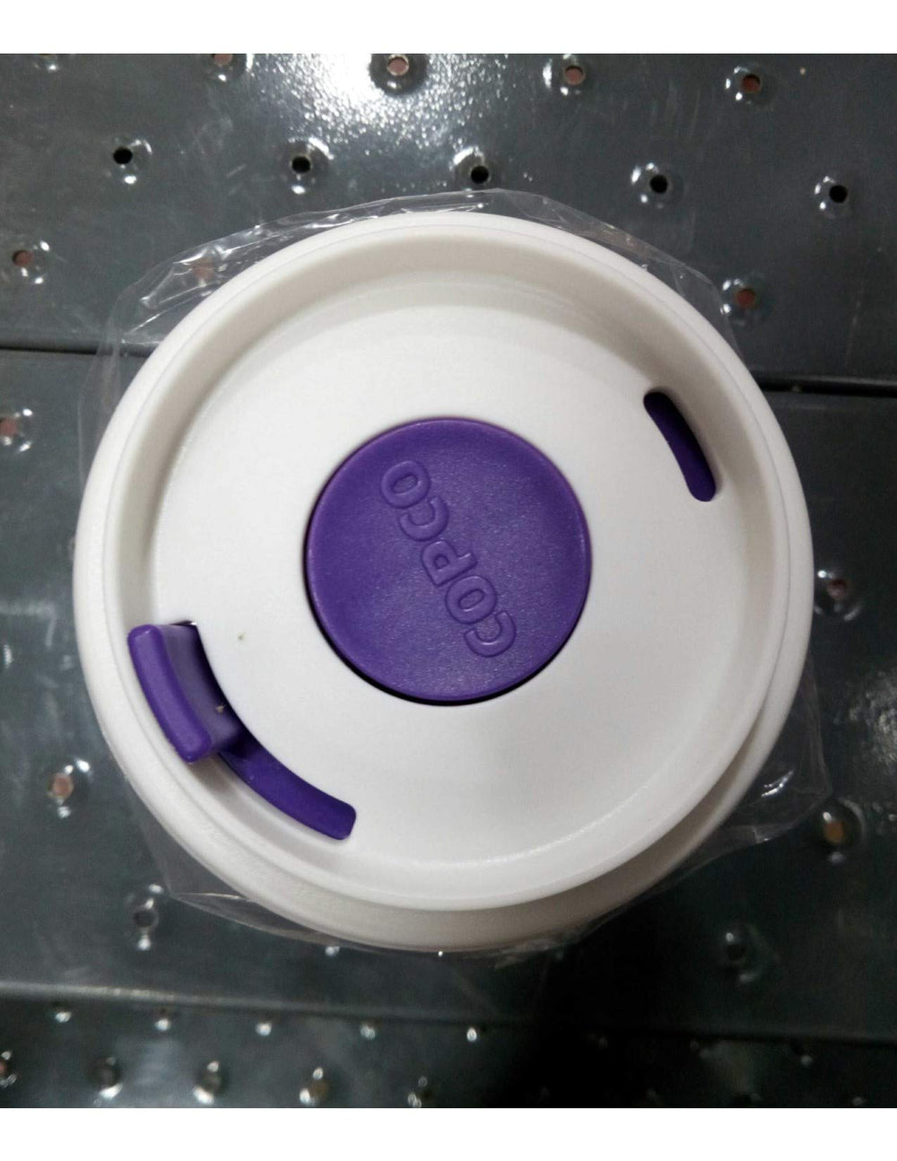 Copco To Go tumbler shows textured non-slip sleeve for secure grip.