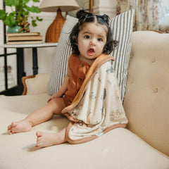 Copper Pearl 3-layer knit fabric closeup highlighting ultra-soft, breathable warmth for baby comfort