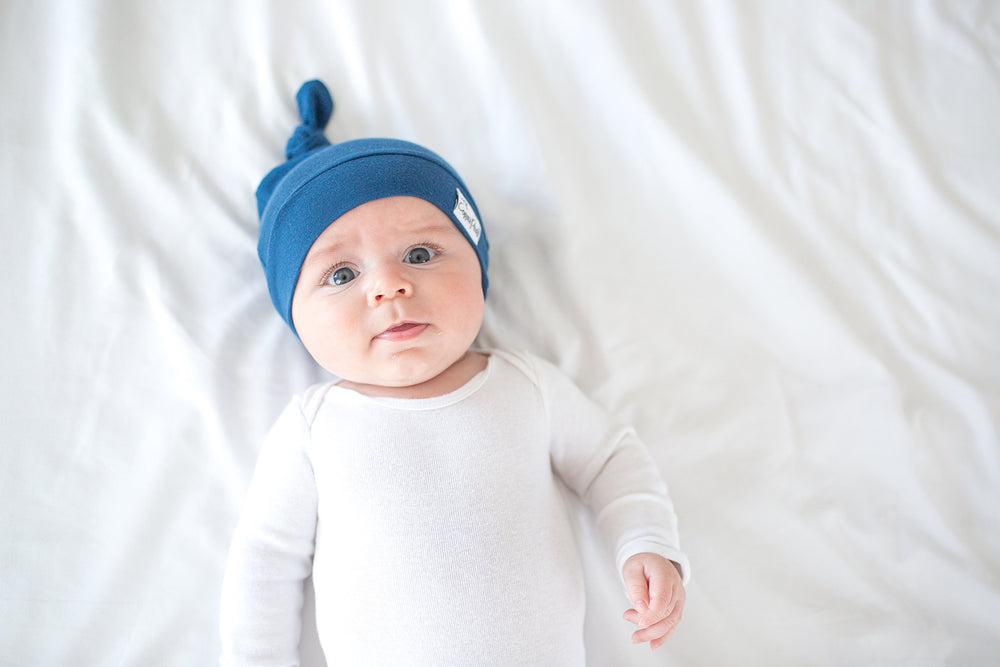 Copper Pearl beanie gift-ready packaging — ideal shower gift or registry add-on.