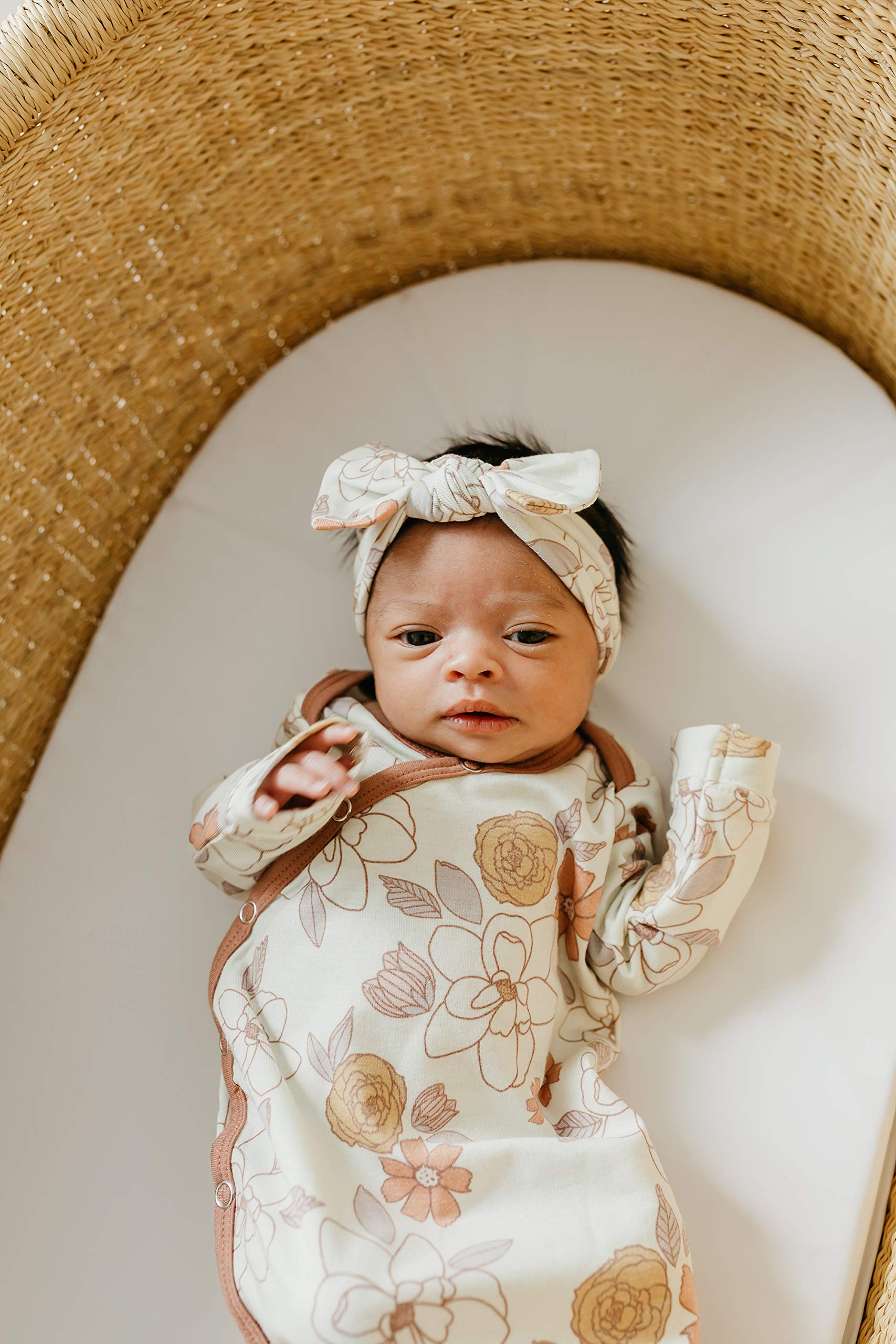 Copper Pearl bows paired with swaddles for coordinated outfits