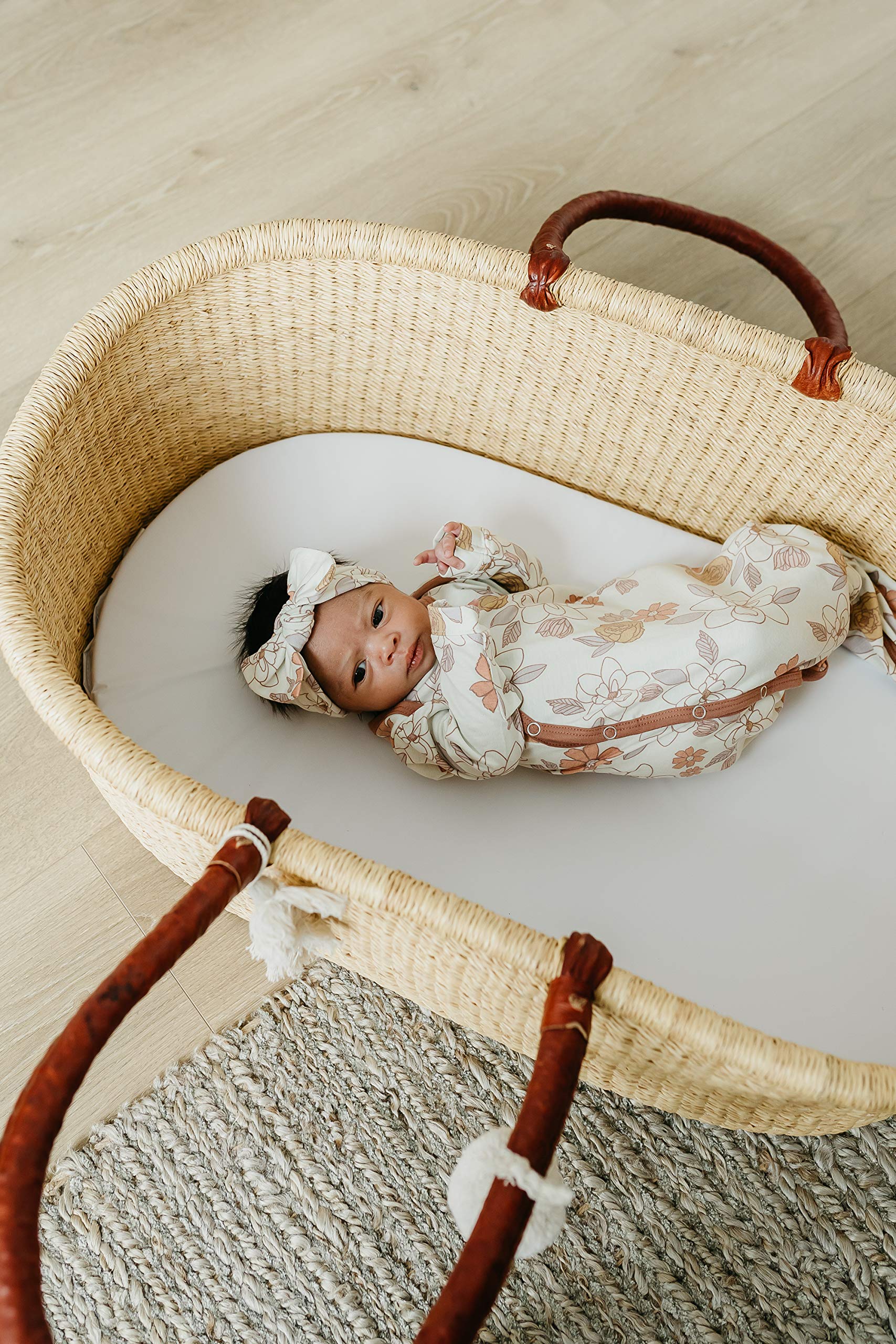 Copper Pearl gift packaging highlights a thoughtful newborn bow gift