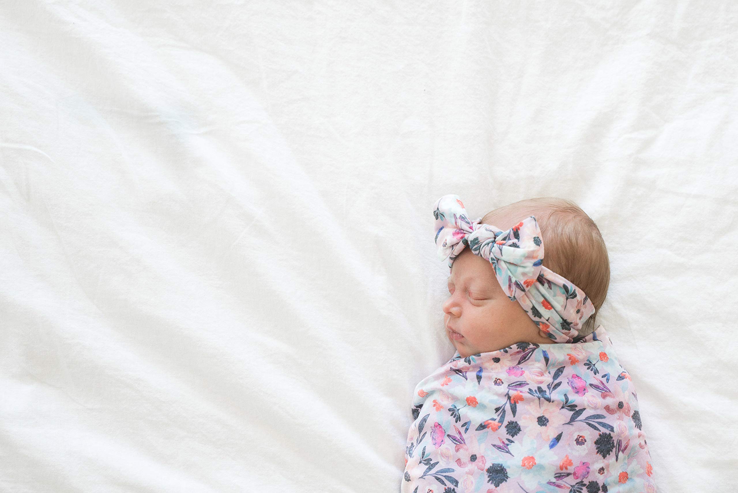 Copper Pearl newborn-friendly bow shown for photo-ready moments.