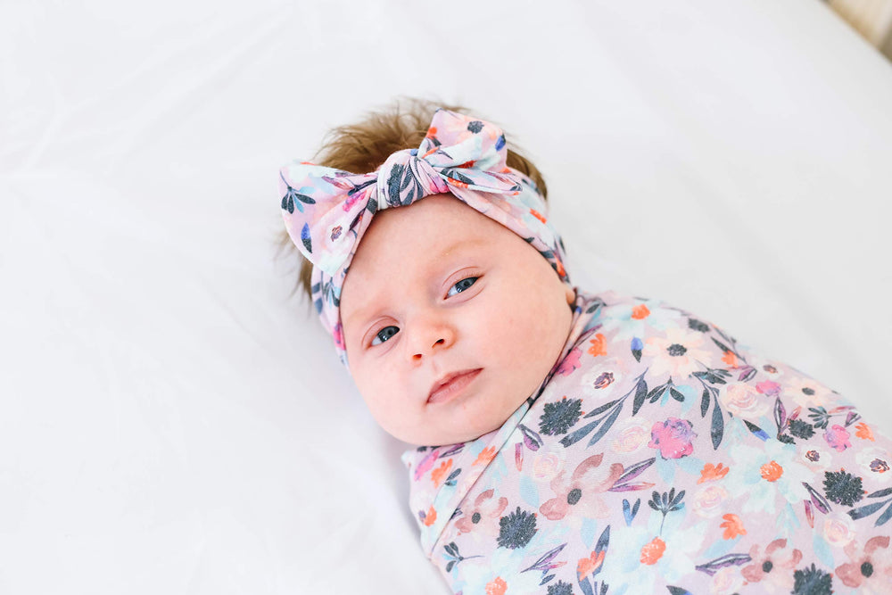 Copper Pearl bow on baby outfits a cute, comfortable daily look.