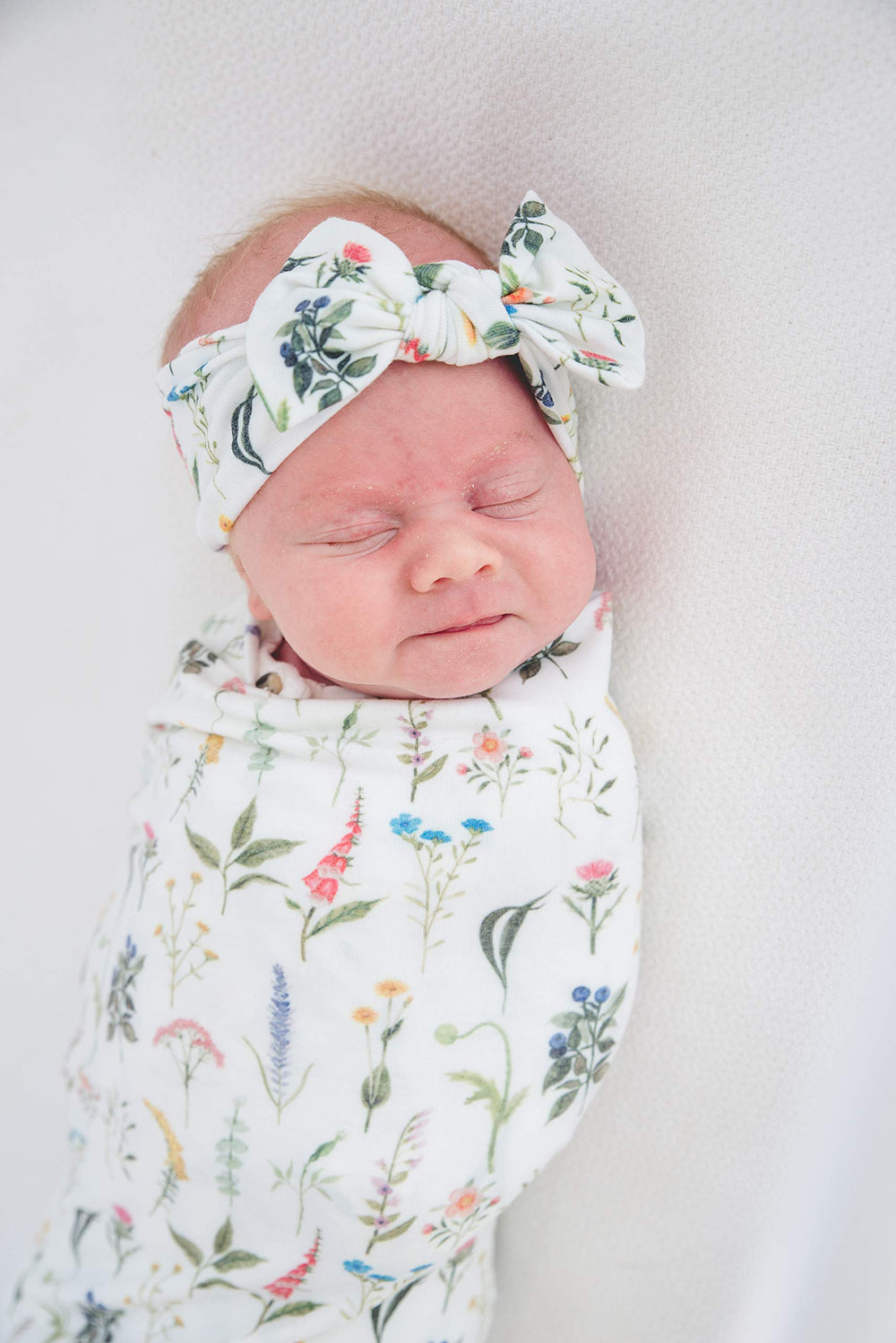 Copper Pearl Baby Bows stretchy-band supports grow-with-baby wear