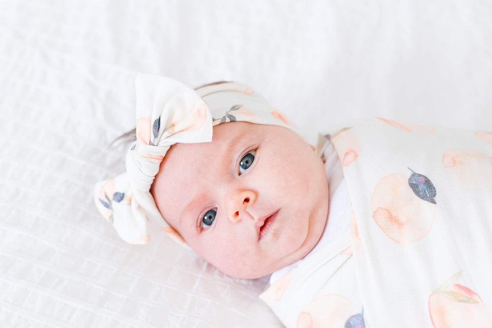 Copper Pearl baby bows trendy designs complement outfits with signature patterns and charm