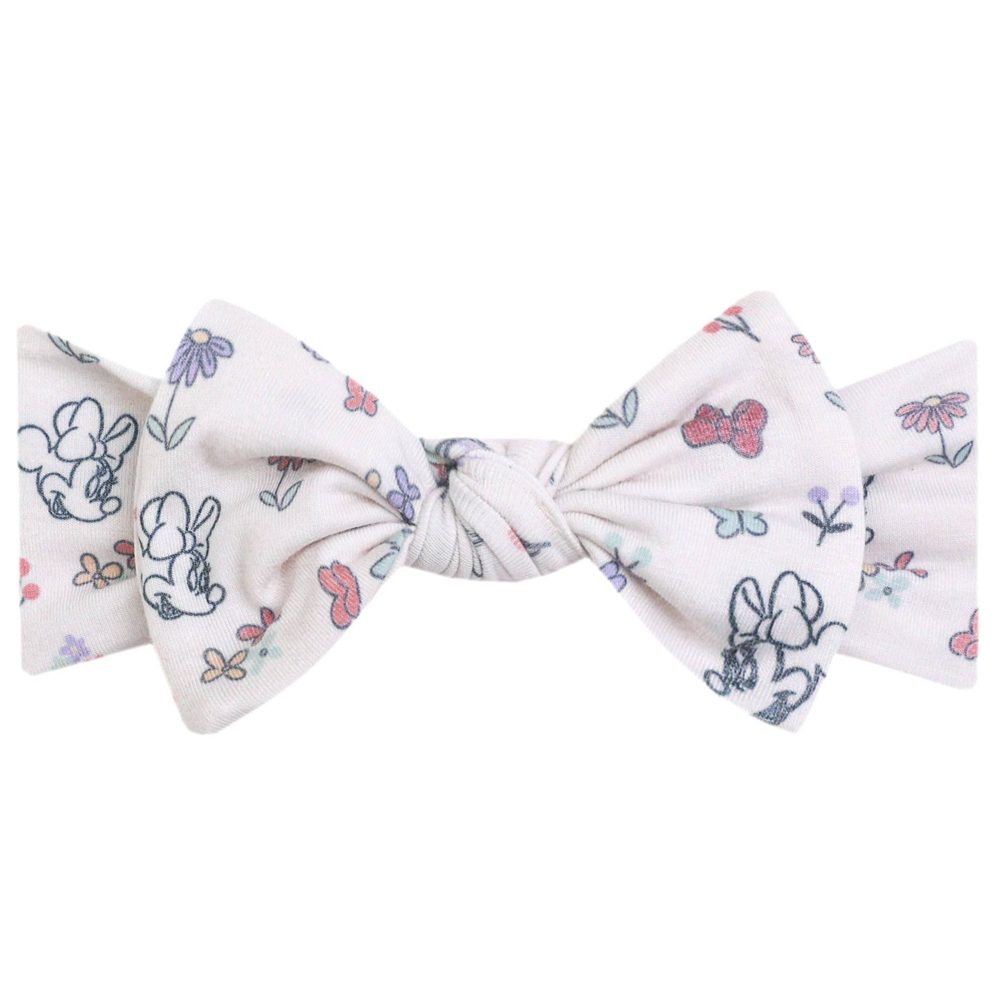 Copper Pearl Minnie Mouse Bowquet headband close-up showing ultra-soft knit for newborn comfort.