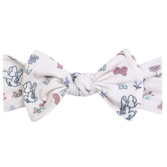 Copper Pearl Minnie Mouse Bowquet headband close-up showing ultra-soft knit for newborn comfort.