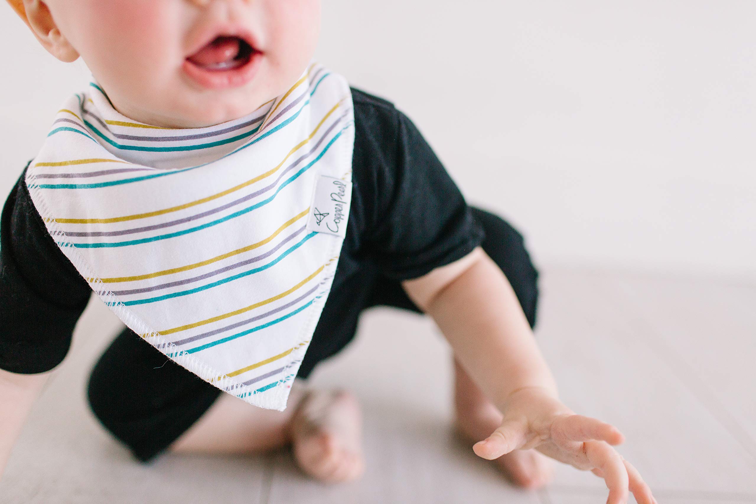 Copper Pearl bandana bib snaps stay put during mealtime and cuddles.