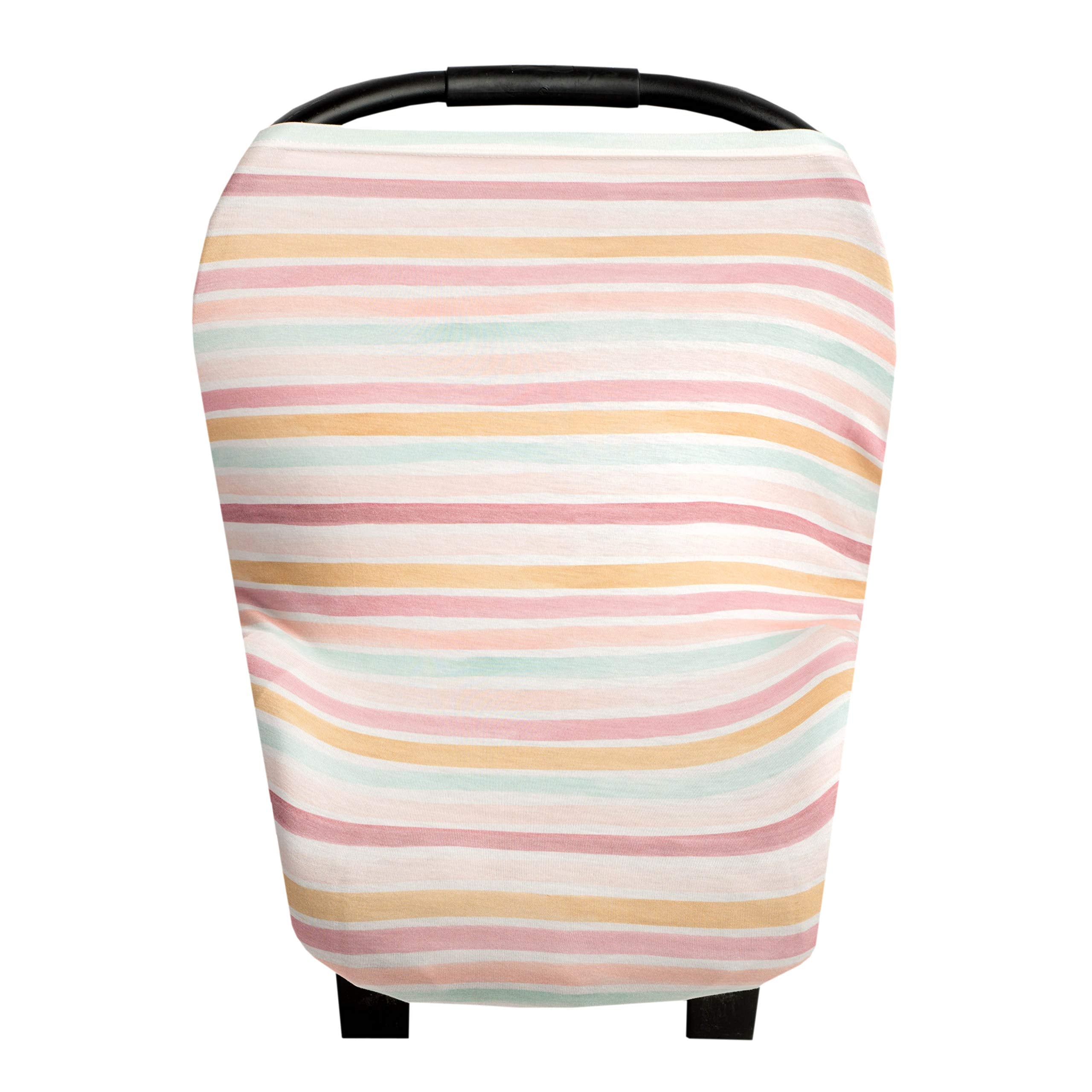 Copper Pearl Belle multi-use cover on a car seat shields sun with breathable fabric.