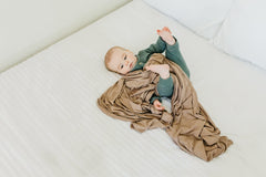 Copper Pearl blanket Gobi features stylish prints for coordinated baby outfits.