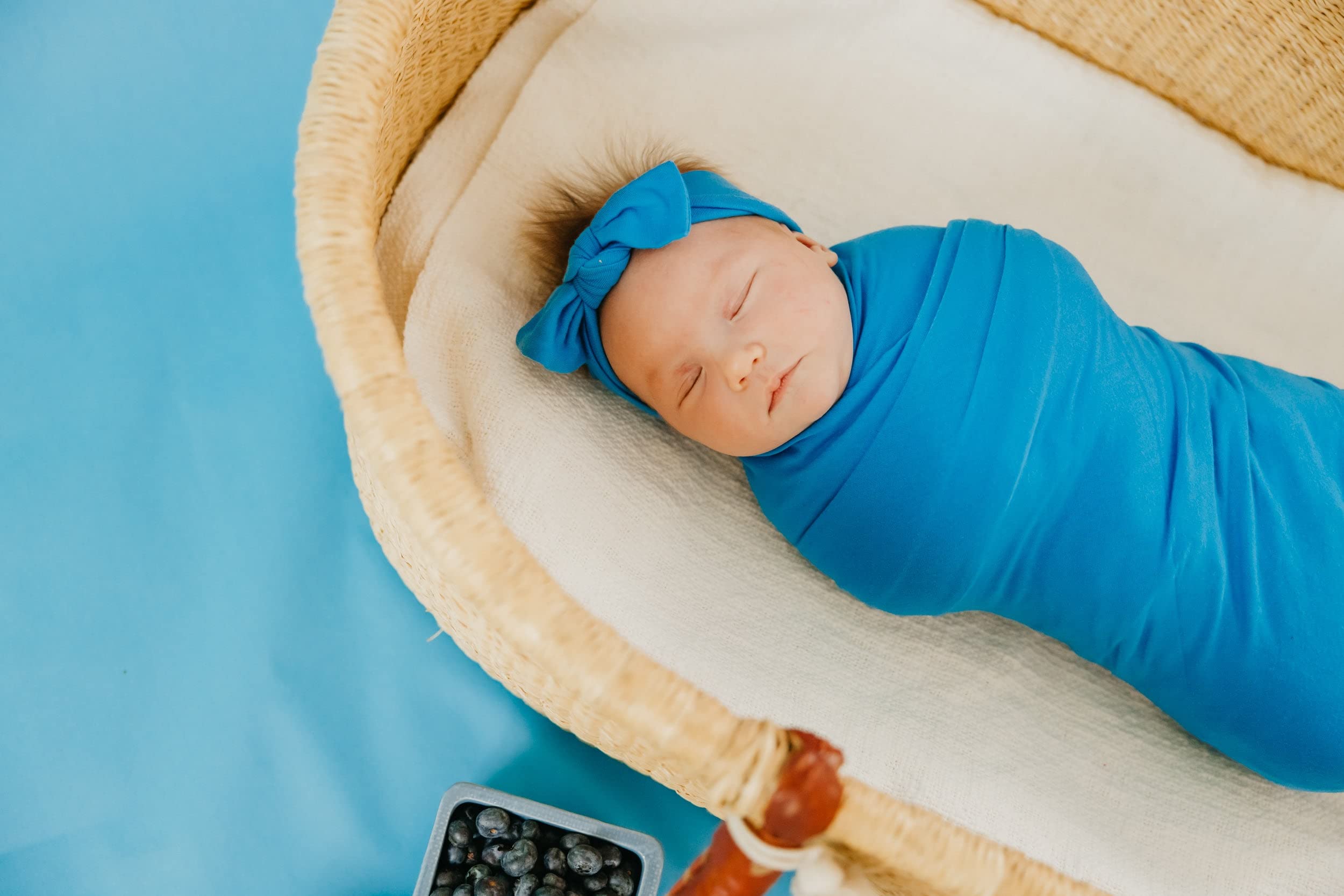 Copper Pearl Blueberry swaddle doubles as nursing cover for discreet feeds.
