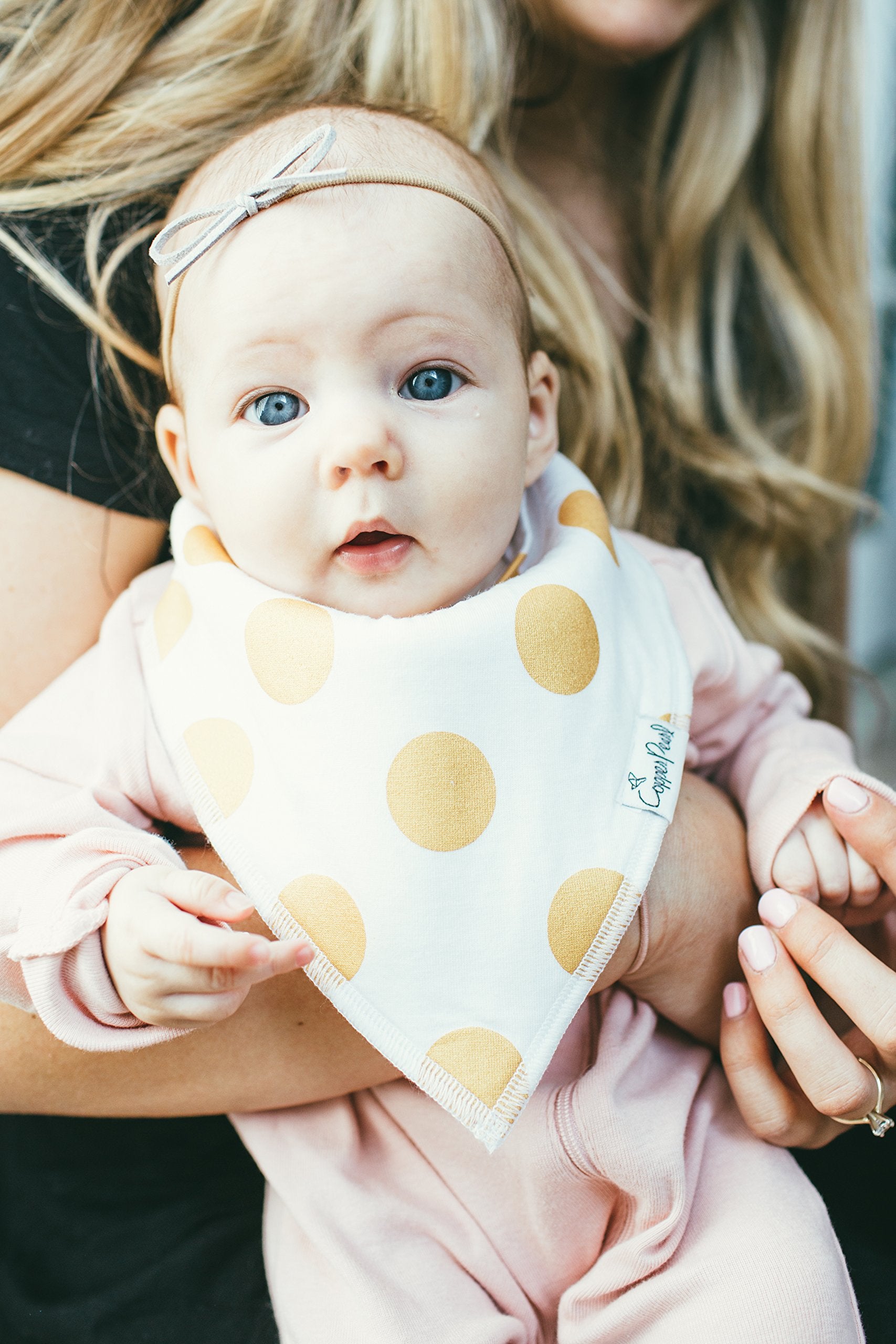 Copper Pearl blush set back soft fleece bib keeps baby dry during mealtime and teething