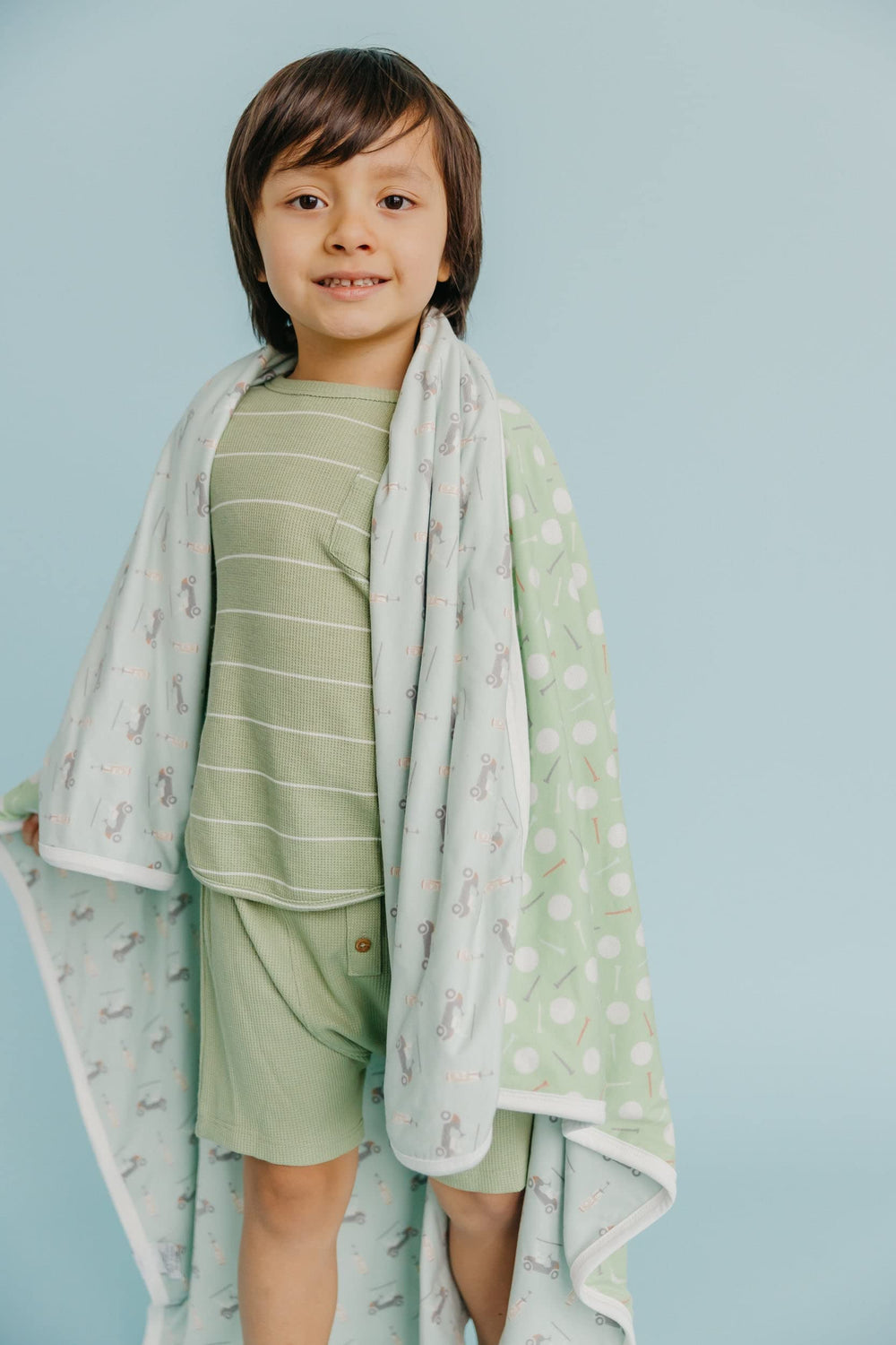 Copper Pearl Bogey three-layer blanket coordinating with signature prints for an effortless nursery look.