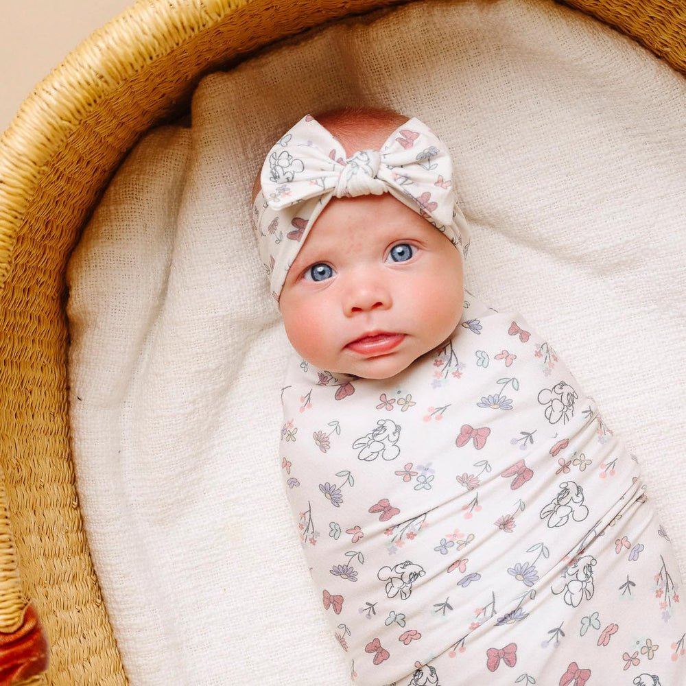 Copper Pearl bow headband Minnie print on newborn-ready fabric boosts everyday baby style.