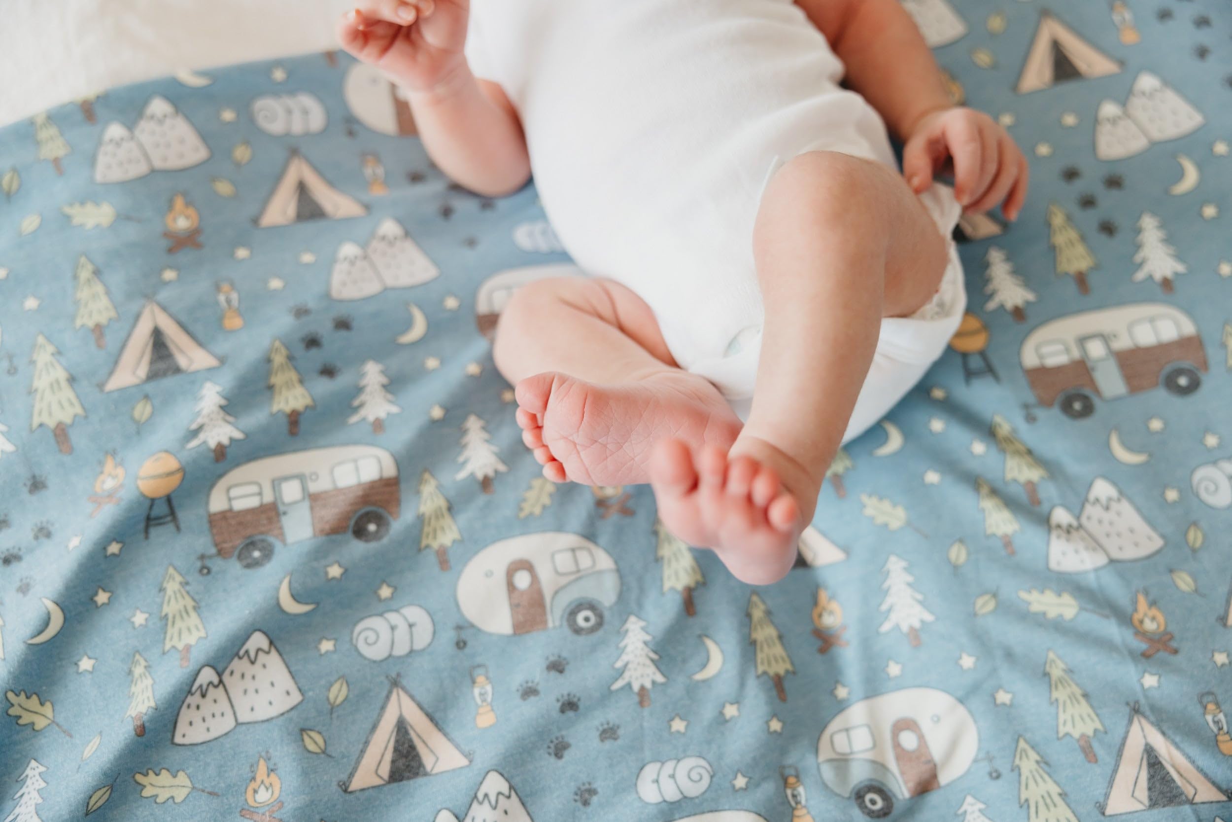 Copper Pearl bridger swaddle blanket machine-washable for easy cleanup between cuddles.