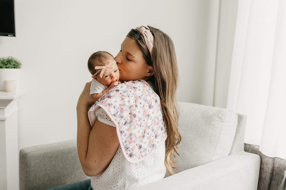 Copper Pearl Bloom Set nursery setup with burp cloths