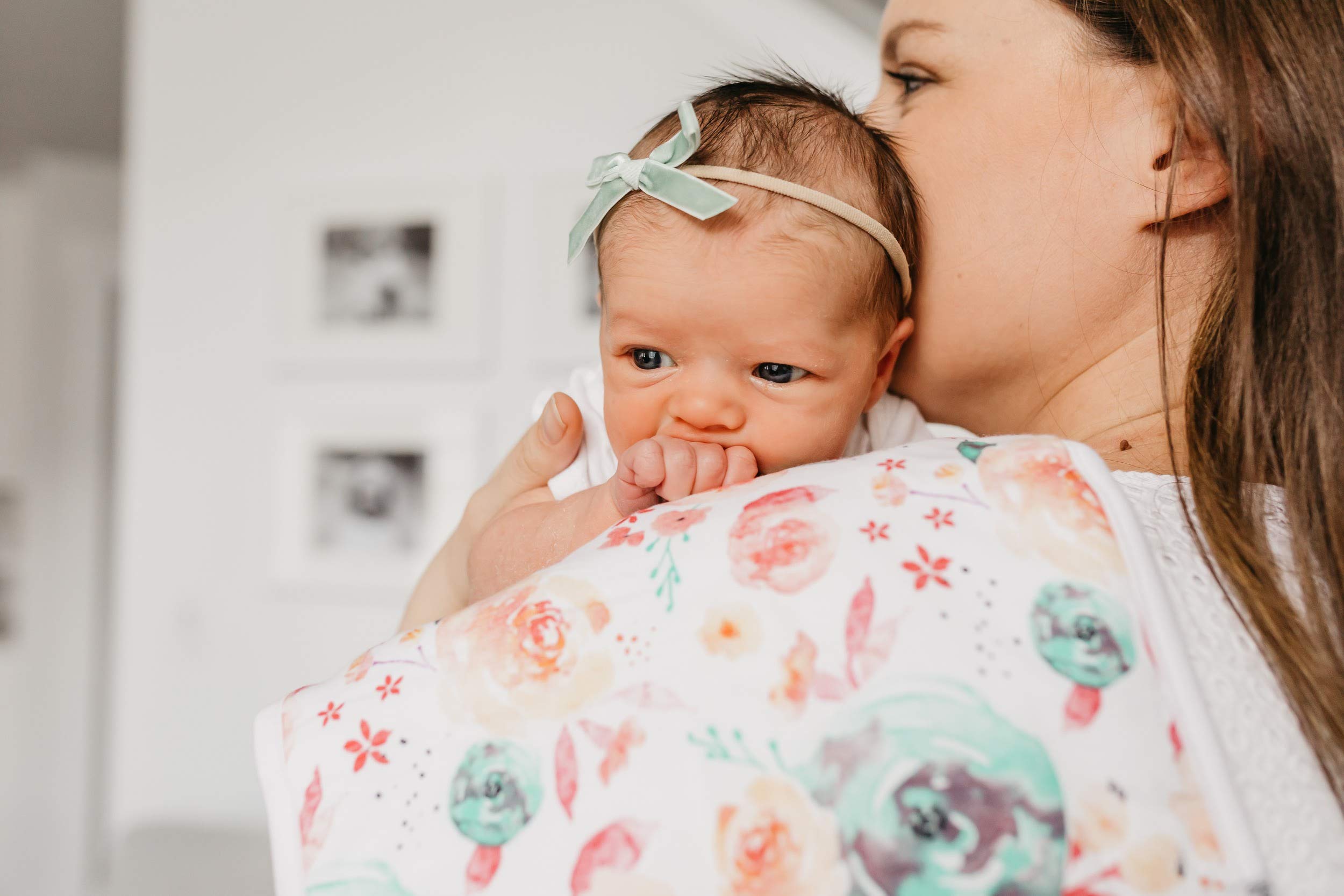 Copper Pearl Bloom Set on a parent's shoulder during burping