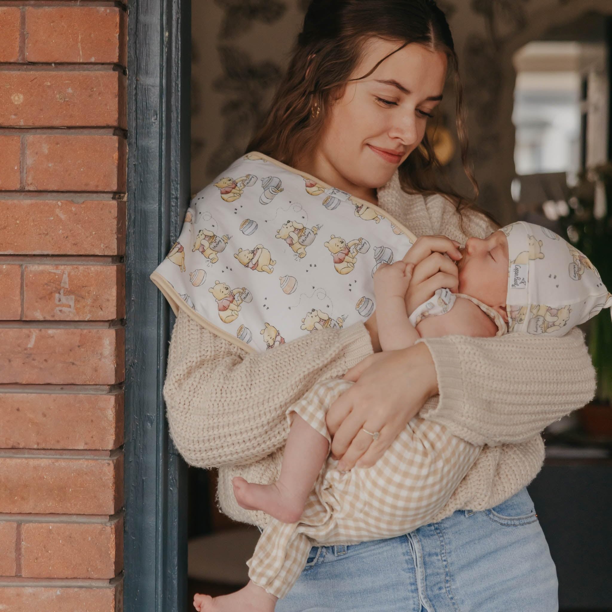 Copper Pearl burp cloth coordinates with bandana bibs for cohesive styling