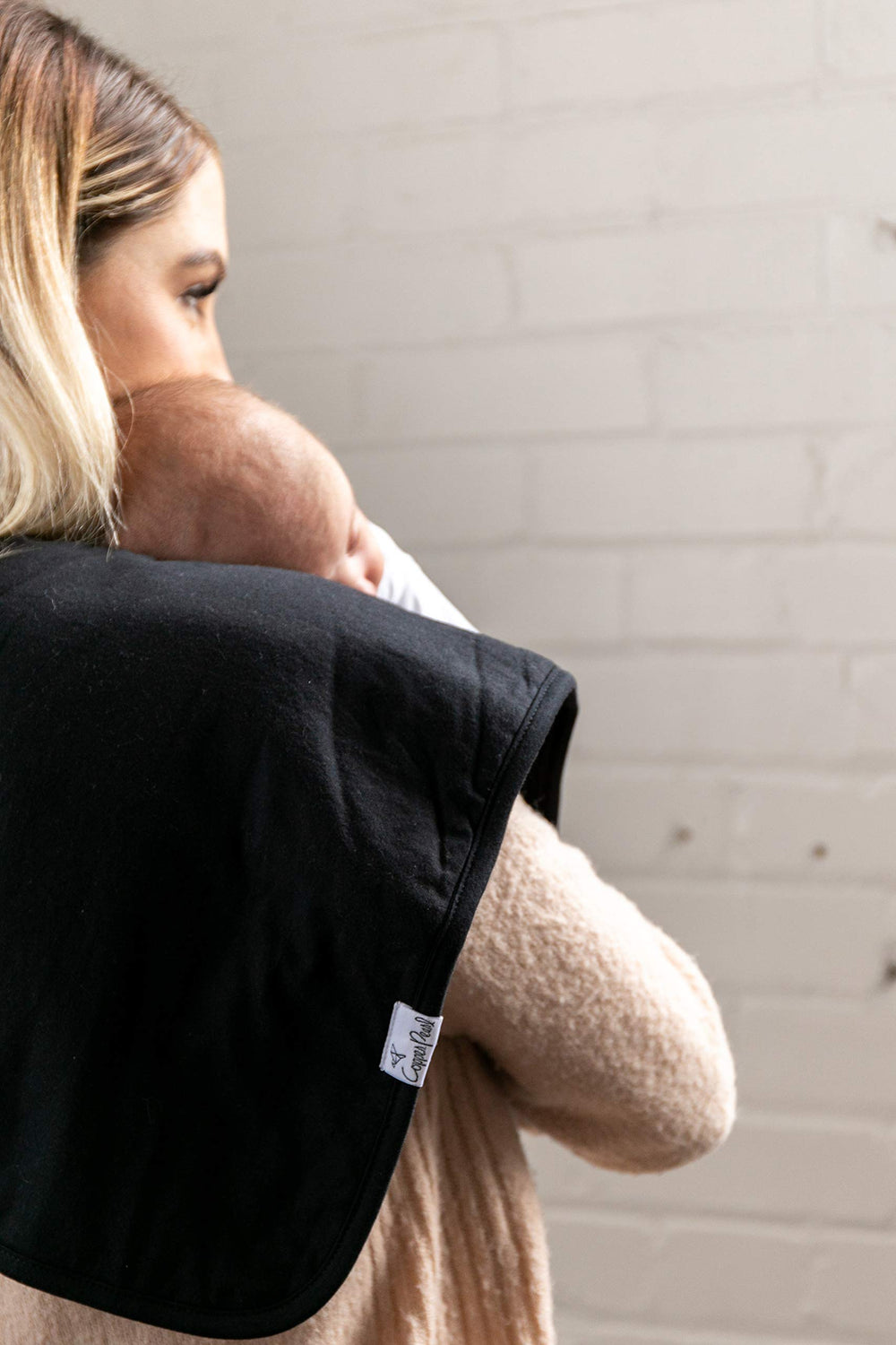 Copper Pearl soft cotton front and back keep baby cozy.