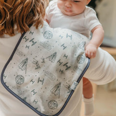 Copper Pearl burp cloths in trendy designs coordinate with bandana bibs.