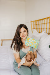 Copper Pearl Lemon Set on shoulder demonstrates soft cotton against baby skin