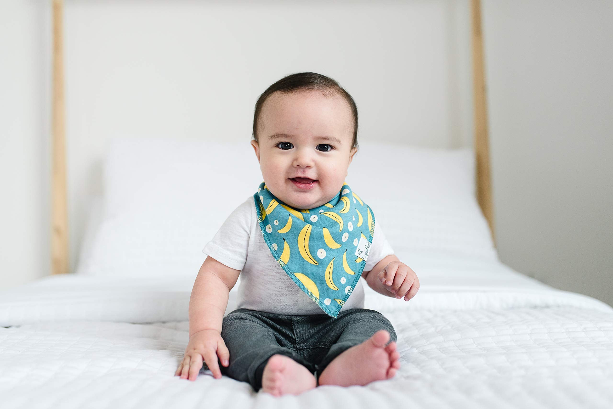 Copper Pearl Citrus Bibs adjustable snaps demonstrate newborn-to-toddler sizing in action