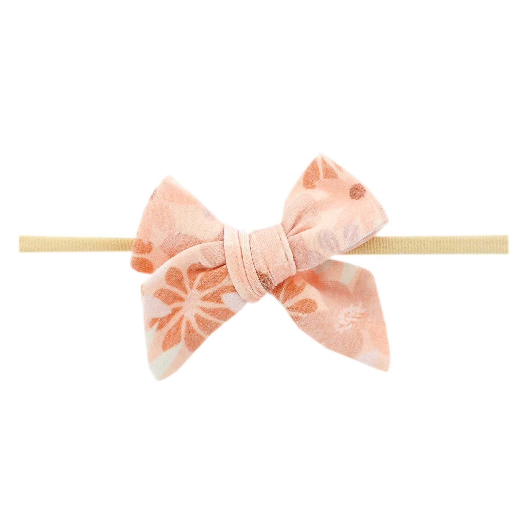 Copper Pearl Classic Baby Bow Penny—front view shows soft stretch for newborn comfort.