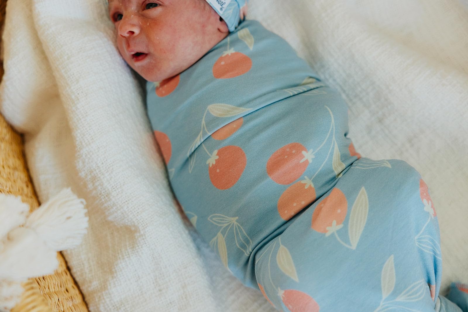 Copper Pearl Clementine swaddle receiving blanket shows versatile wrap option for cozy moments.