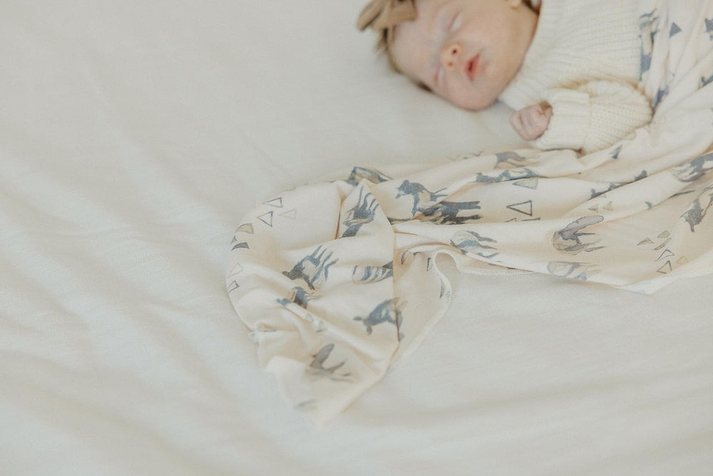 Copper Pearl Cody swaddle blanket machine-washable on cold for easy care.