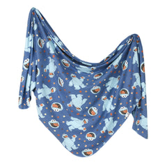 Copper Pearl Cookie Monster swaddle blanket soft fabric closeup for gentle baby comfort.
