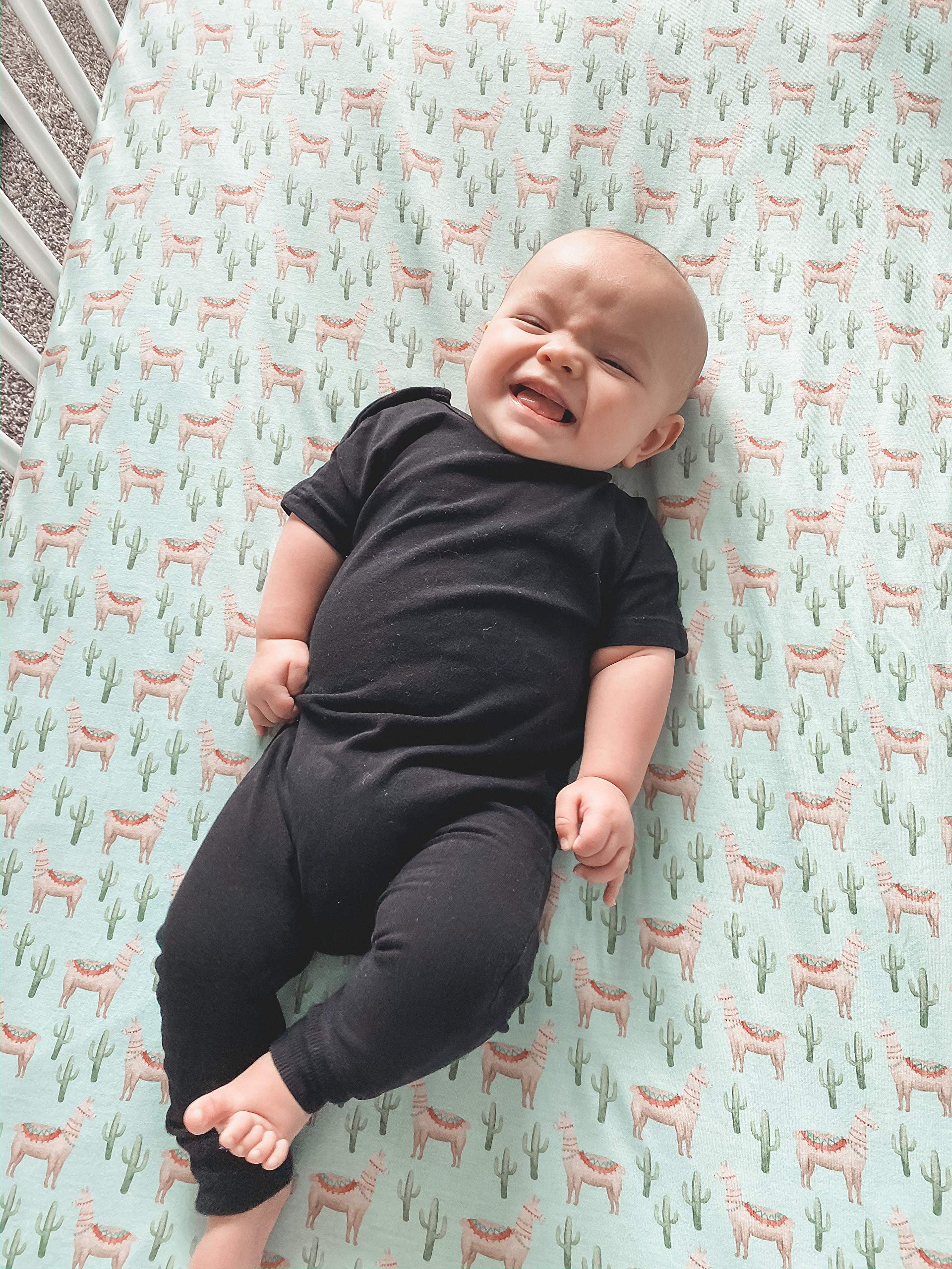 Copper Pearl Cusco knit crib sheet in a cozy nursery sleep scene