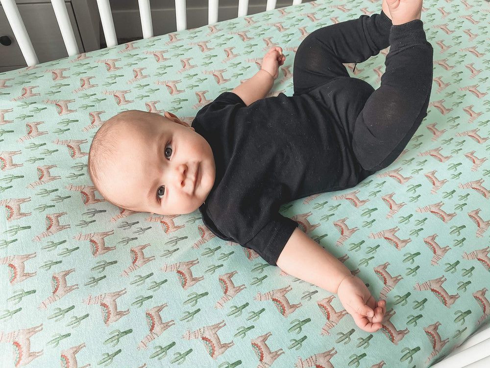 Copper Pearl Cusco knit crib sheet elastic stitching for a tight, clean fit
