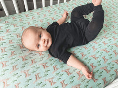 Copper Pearl Cusco knit crib sheet elastic stitching for a tight, clean fit