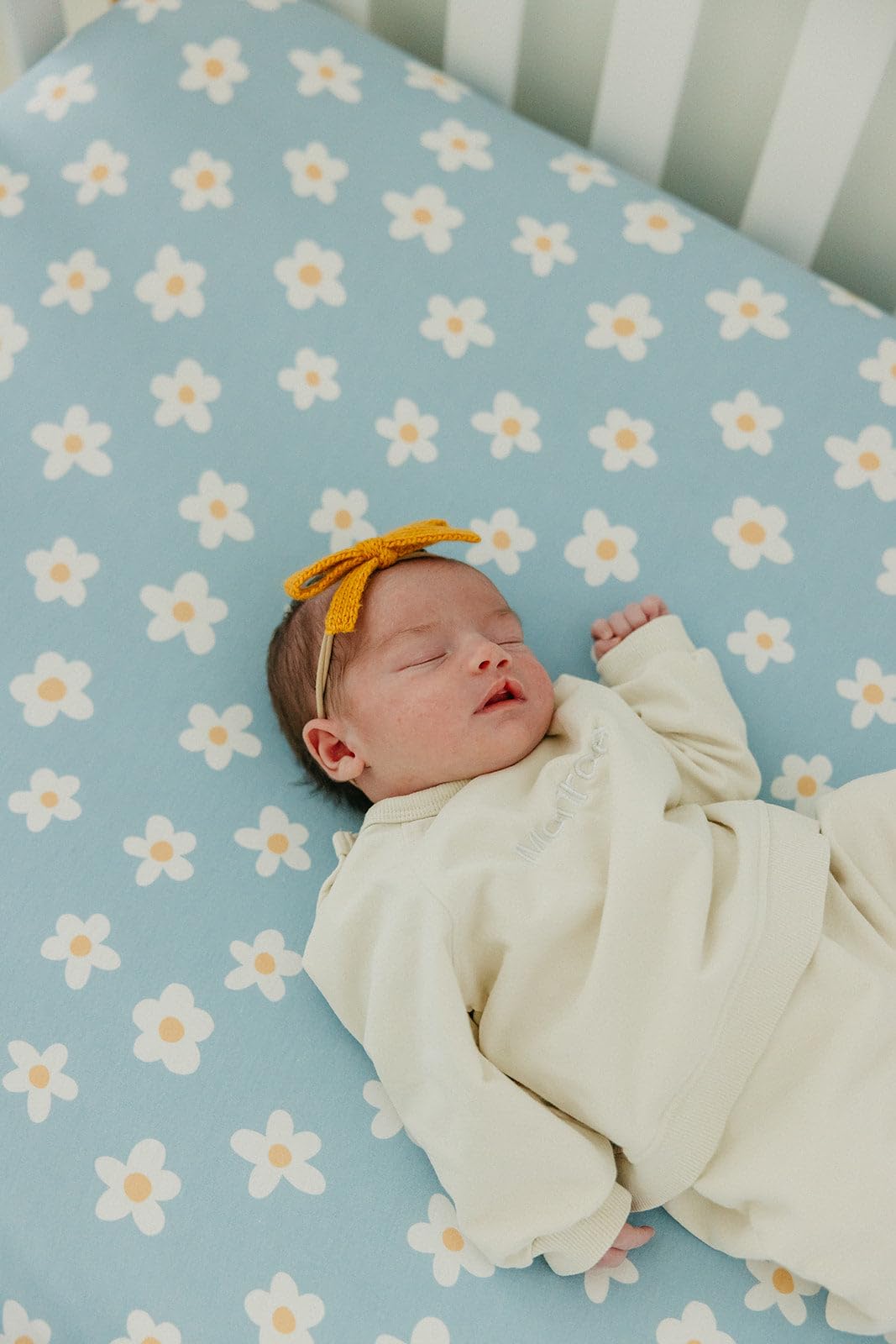 Copper Pearl Della toddler version image highlights multi-use sheet for growing sleepers
