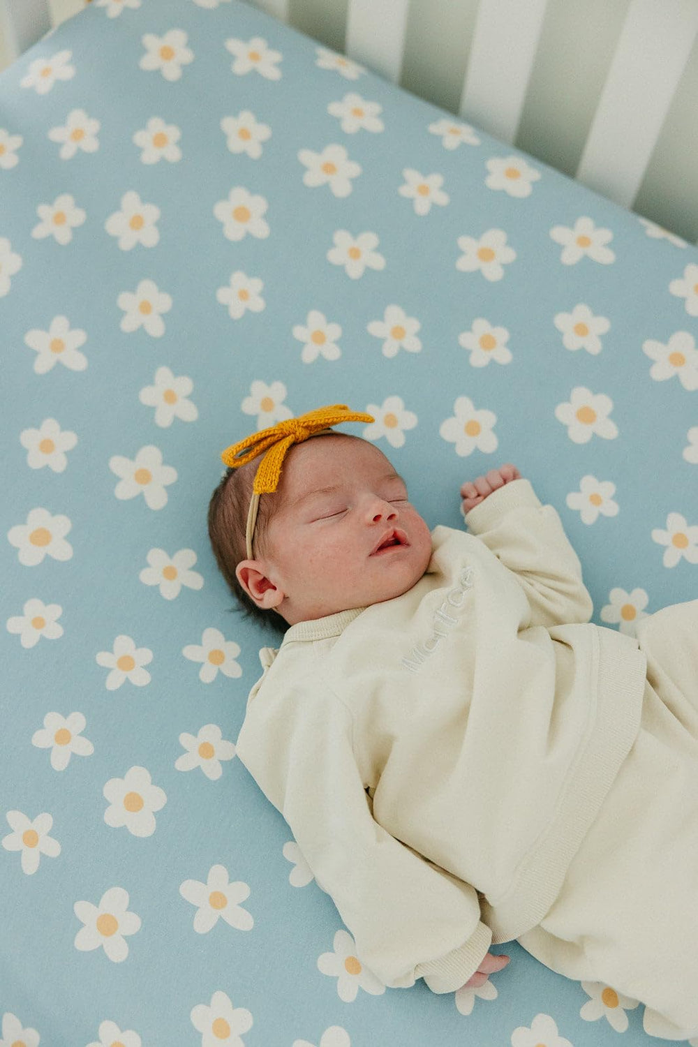 Copper Pearl Della toddler version image highlights multi-use sheet for growing sleepers