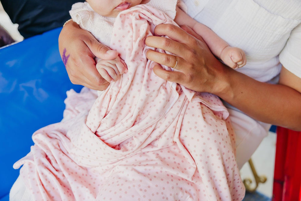 Copper Pearl Dottie swaddle blanket gift-ready packaging for baby showers.