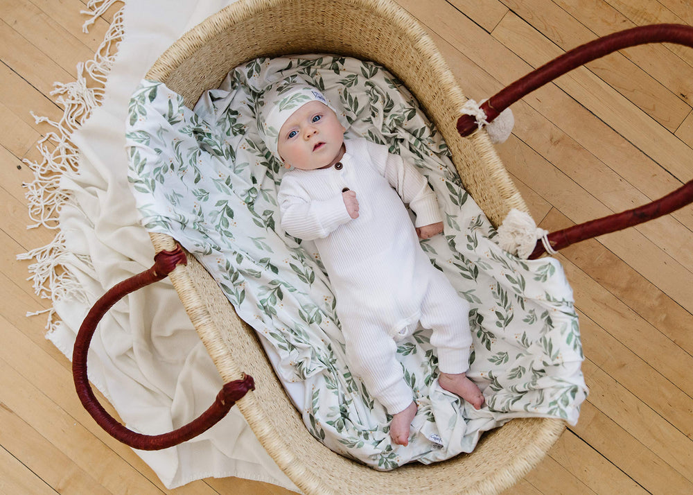 Copper Pearl Fern swaddle blanket durable stretch for easy wrapping.