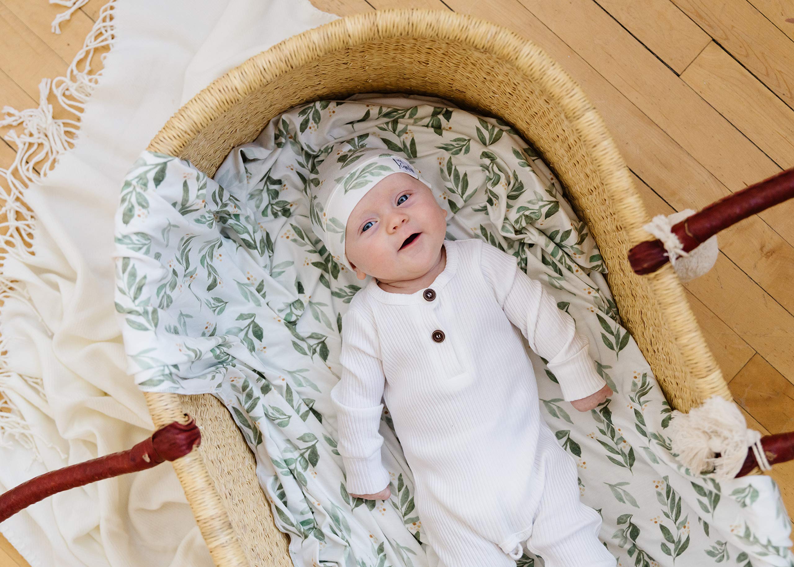 Copper Pearl Fern swaddle blanket lightweight breathable knit keeps baby comfortable.
